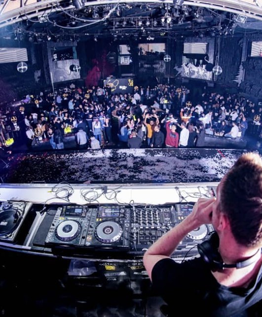 Club crowd seen from the DJ booth